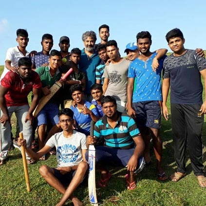 Director SS Rajamouli plays cricket with a local Tamil cricket team