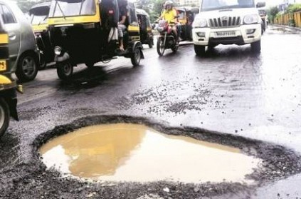 After losing son to pothole, man fills up over 500 of them.