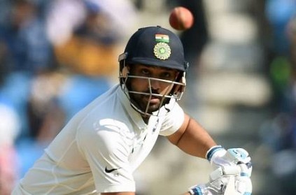Tim Payne teases Rohit Sharma during Test match