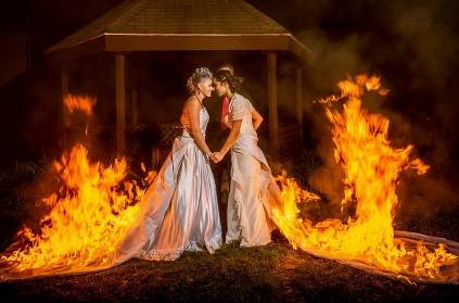 Brides celebrate marriage by burning their dresses in US