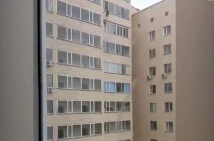 Watch - Man saves boy dangling from 10th floor of apartment