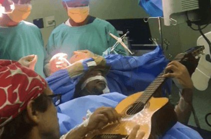 South African musician plays guitar while undergoing brain surgery